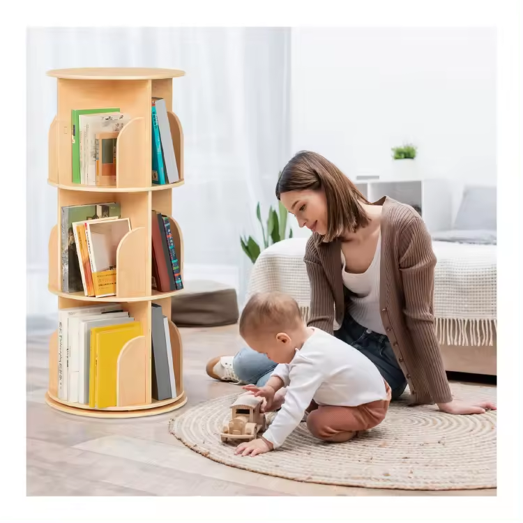 mom and toddler near rotating bookshelf